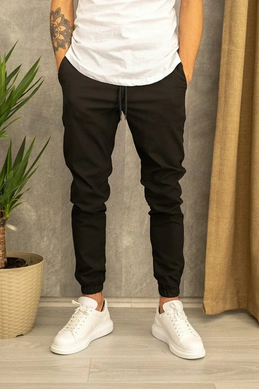 https://cdn.shopify.com/s/files/1/0657/5138/4294/files/2022-d-nne-beil-ufige-hosen-sommer-m-nner-bleistift-hosen-mode-atmungs-d-nne-elastische_jpg_Q90_jpg_bb0b84d7-7105-465e-ad7a-3534a7be6a6d.webp?v=1745935101