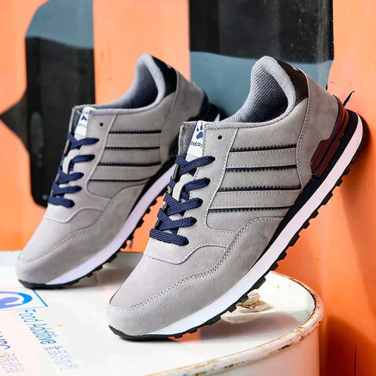 https://cdn.shopify.com/s/files/1/0657/5138/4294/files/Men-s-Sneakers-Artificial-Leather-Men-Casual-Shoes-High-Quality-Shoes-For-Men-2022-New-Breathable_1800x1800_ee15fd7b-4ab8-4248-ad1c-5dfcb96e3e81.webp?v=1745593017