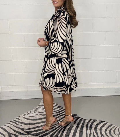 Elegantes Damenkleid Mit Anmutigem Druck, Locker Und Knielang Für Gartenpartys Und Strandspaziergänge