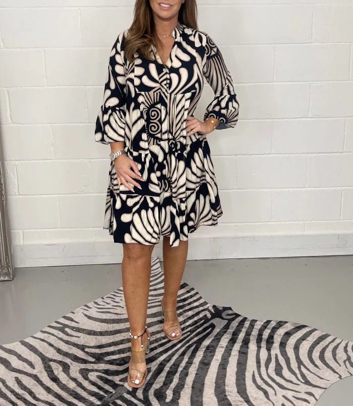 Elegantes Damenkleid Mit Anmutigem Druck, Locker Und Knielang Für Gartenpartys Und Strandspaziergänge