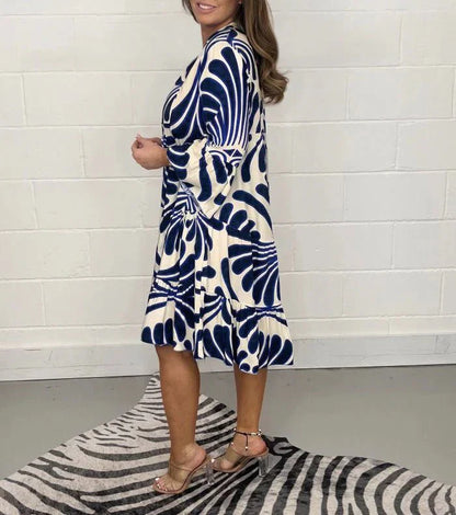 Elegantes Damenkleid Mit Anmutigem Druck, Locker Und Knielang Für Gartenpartys Und Strandspaziergänge